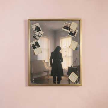 背影磨旧了镜子